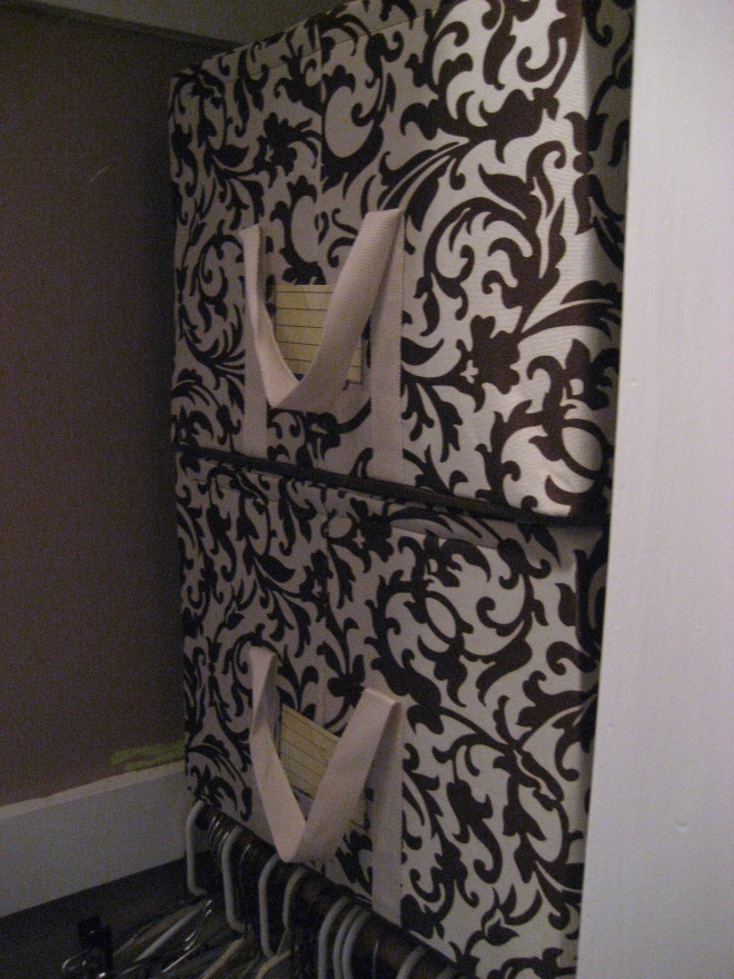 fabric boxes in the closet